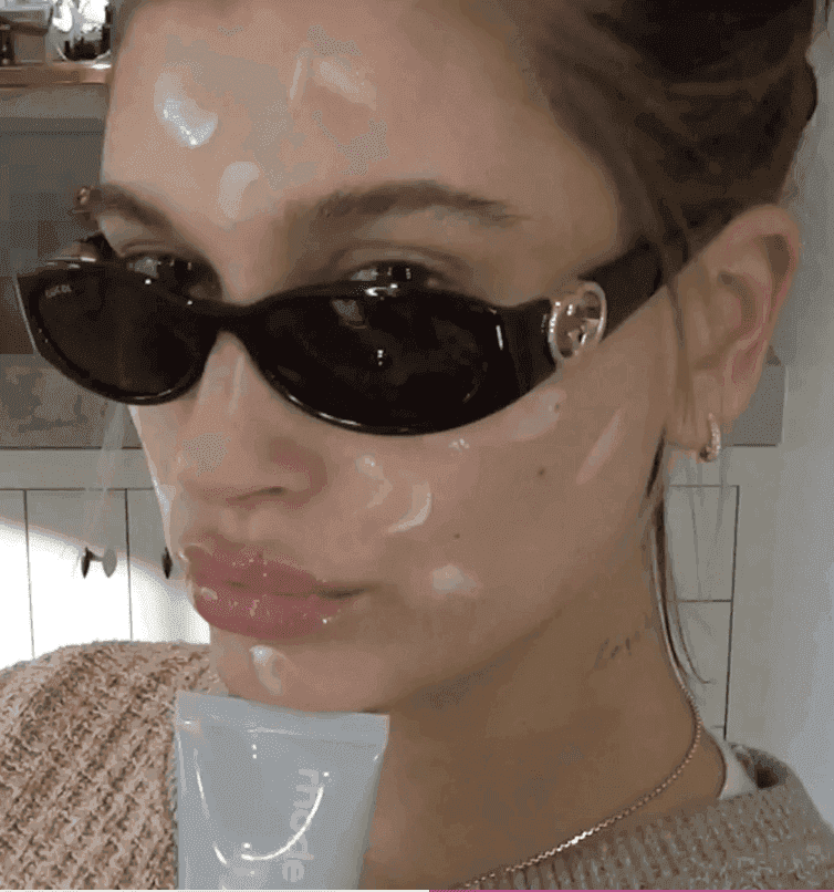 HB holding barrier butter, with a splashes of cream on her face