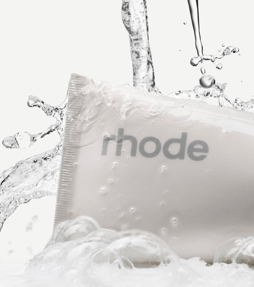 water pouring down the bottle of pineapple refresh cleanser