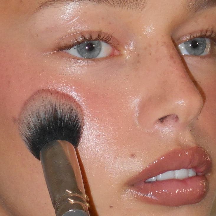 lily wears pocket blush in tan line