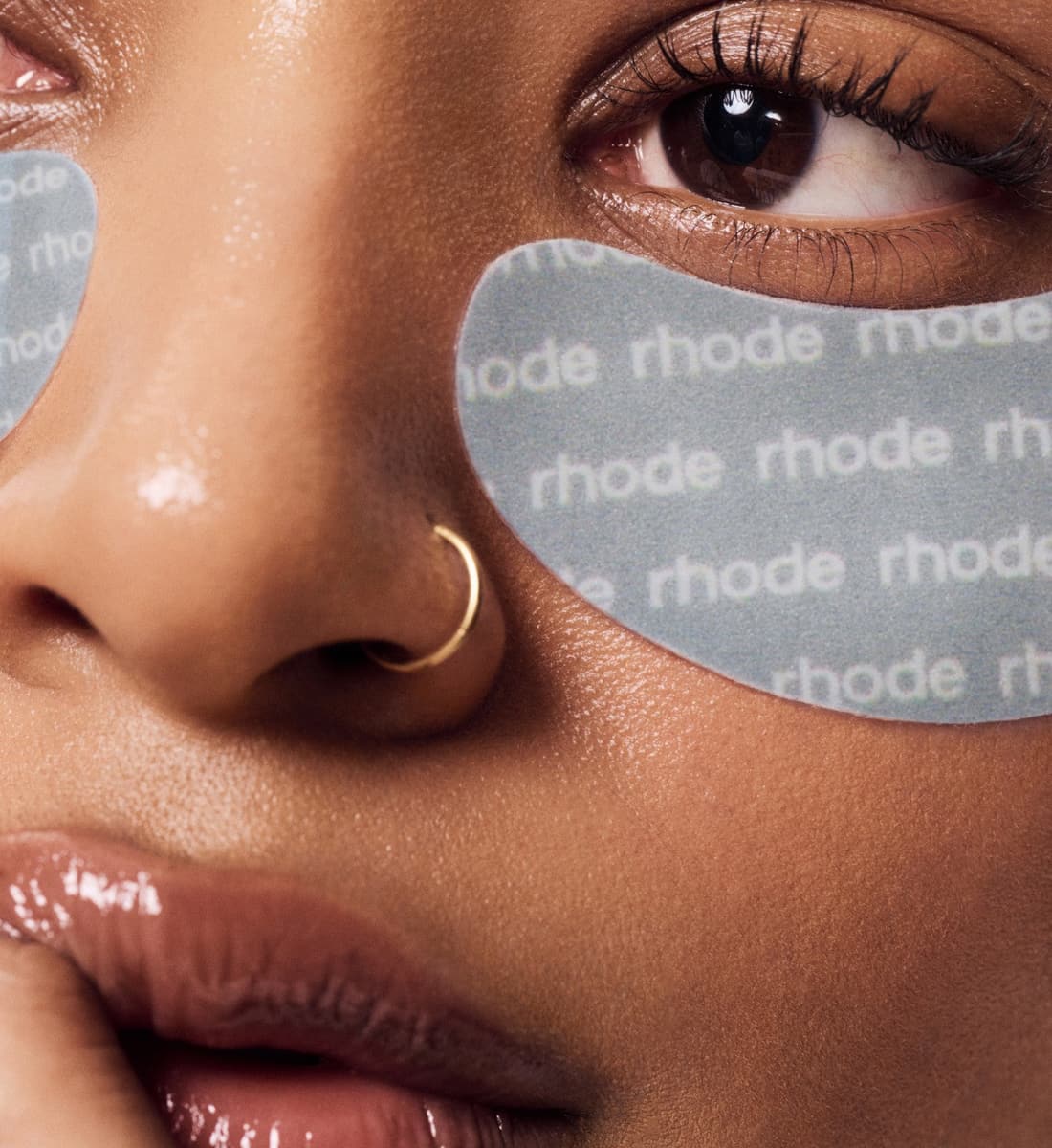 model wearing peptide eye prep rhode logo