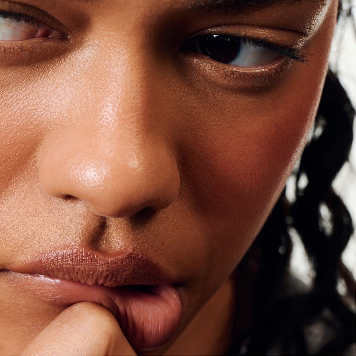 model wearing peptide lip shape in lean