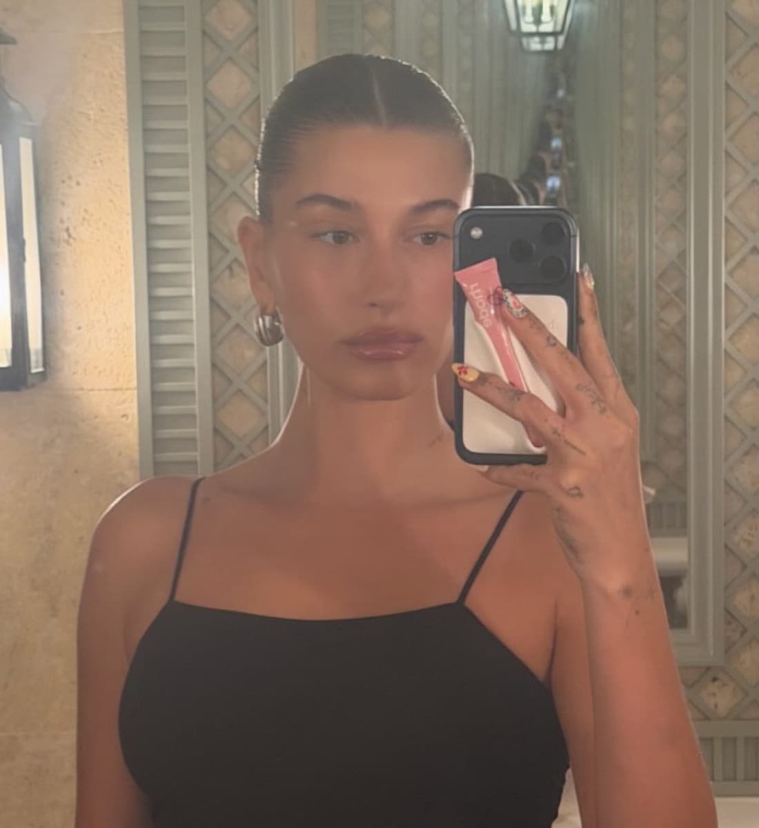 hailey with white snap-on lip case with scented peptide lip tint ribbon